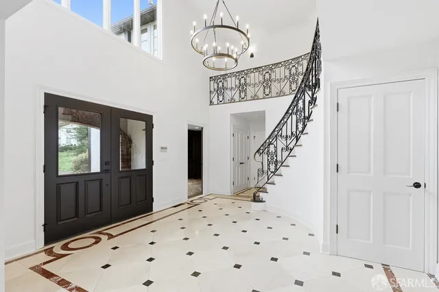 a kitchen with stainless steel appliances kitchen island granite countertop a sink and cabinets