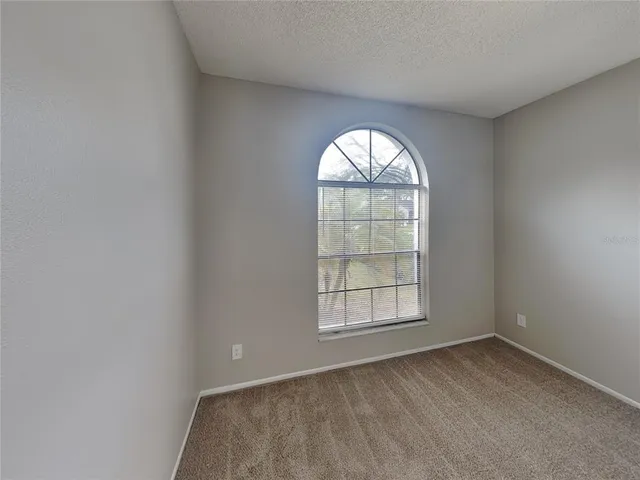 an empty room with window
