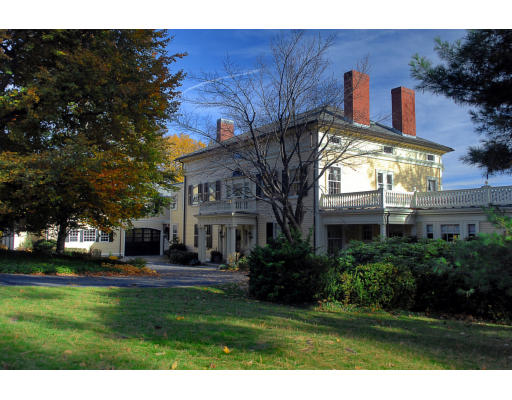 164 Chestnut Hill Road Newton, MA 02467 - Photo 1 of 1 a front view of a house with a garden