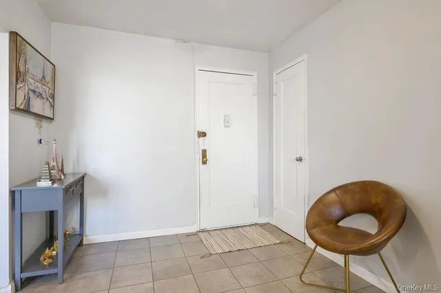 a view of a room with workspace and a fireplace