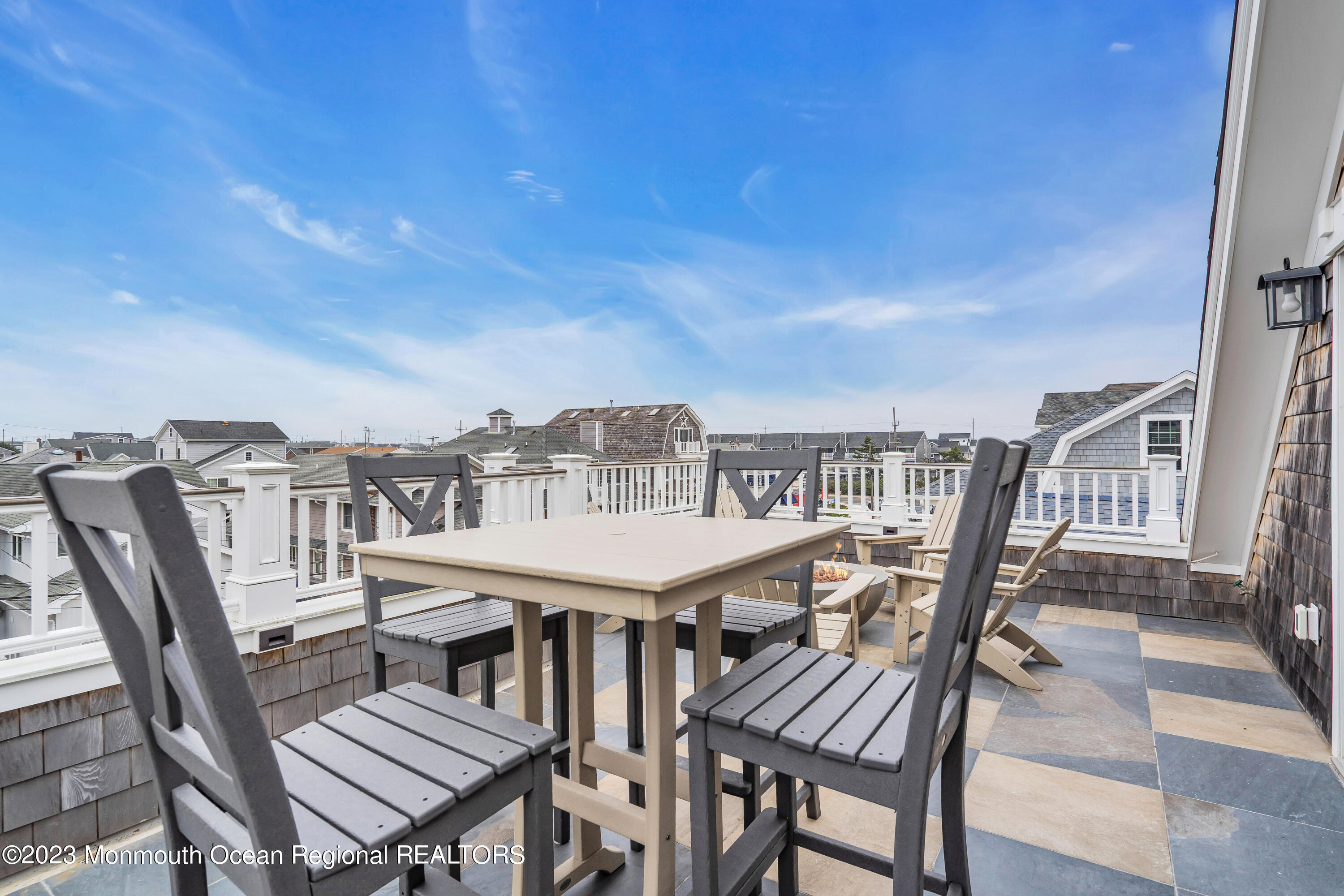 32 3rd Avenue Lavallette, NJ 08735 - Photo 12 of 12 a view of a balcony with furniture