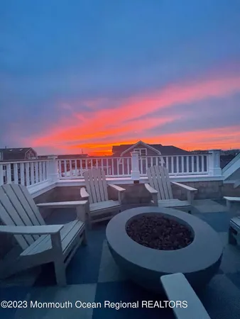 a view of a chairs and table in the patio