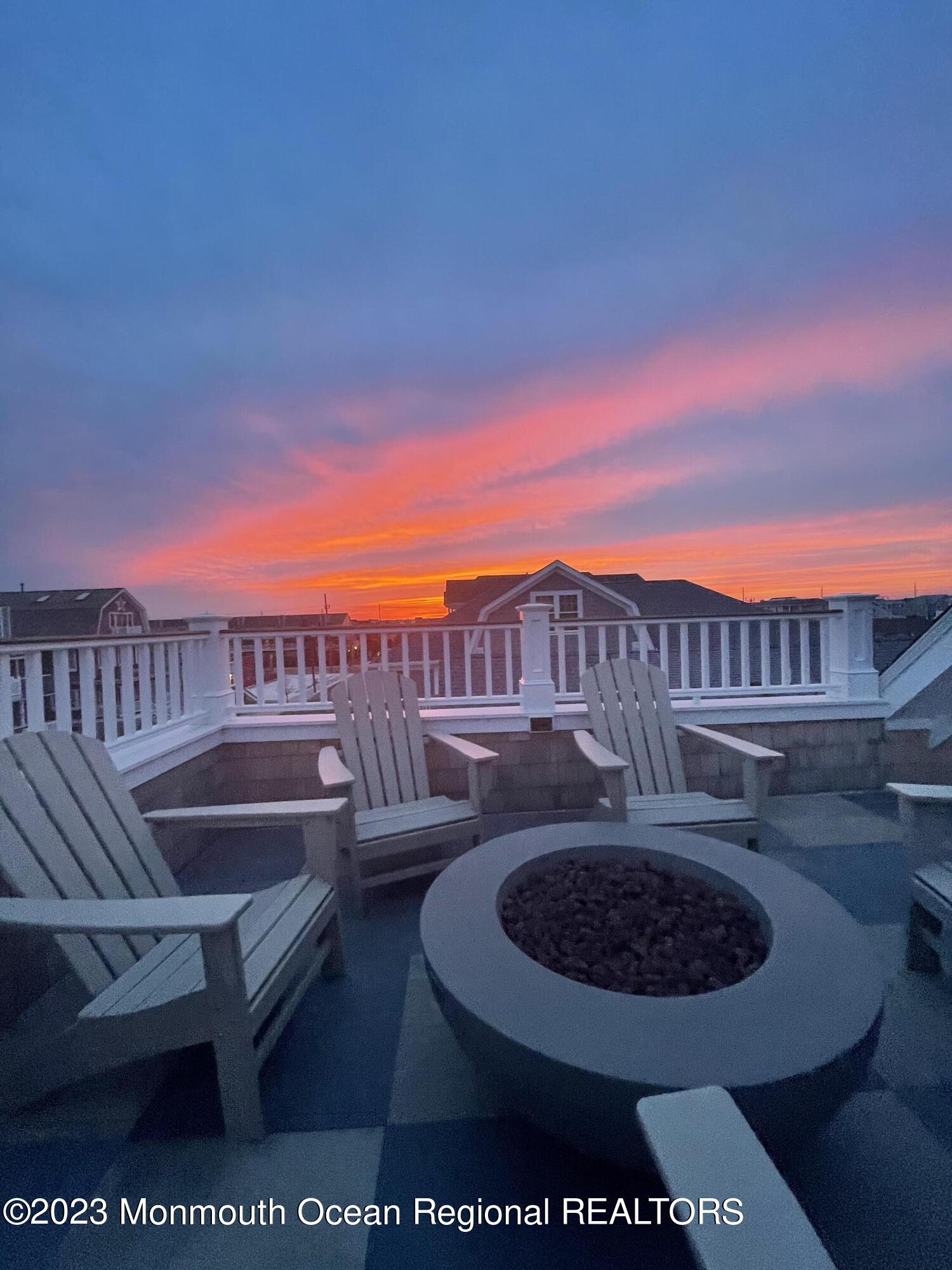 32 3rd Avenue Lavallette, NJ 08735 - Photo 8 of 12 a view of a chairs and table in the patio
