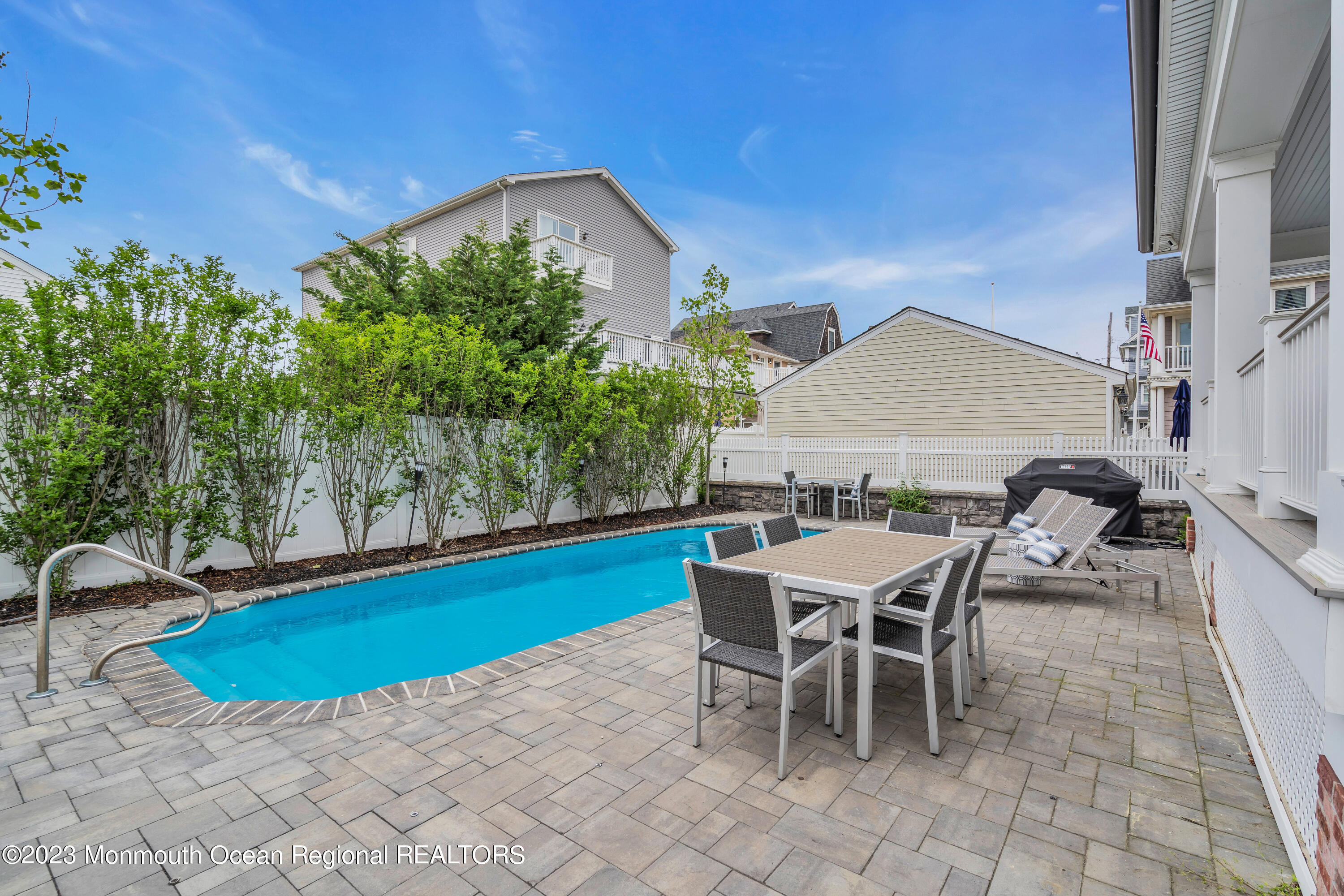 32 3rd Avenue Lavallette, NJ 08735 - Photo 10 of 12 a view of a chairs and table in the patio