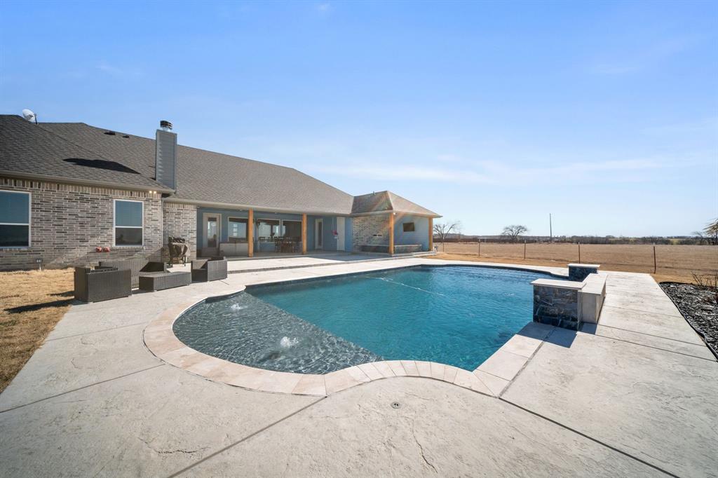 10405 Singleton Road Midlothian, TX 76065 - Photo 37 of 39 Swimming pool with a patio area, a fenced backyard, and outdoor seating