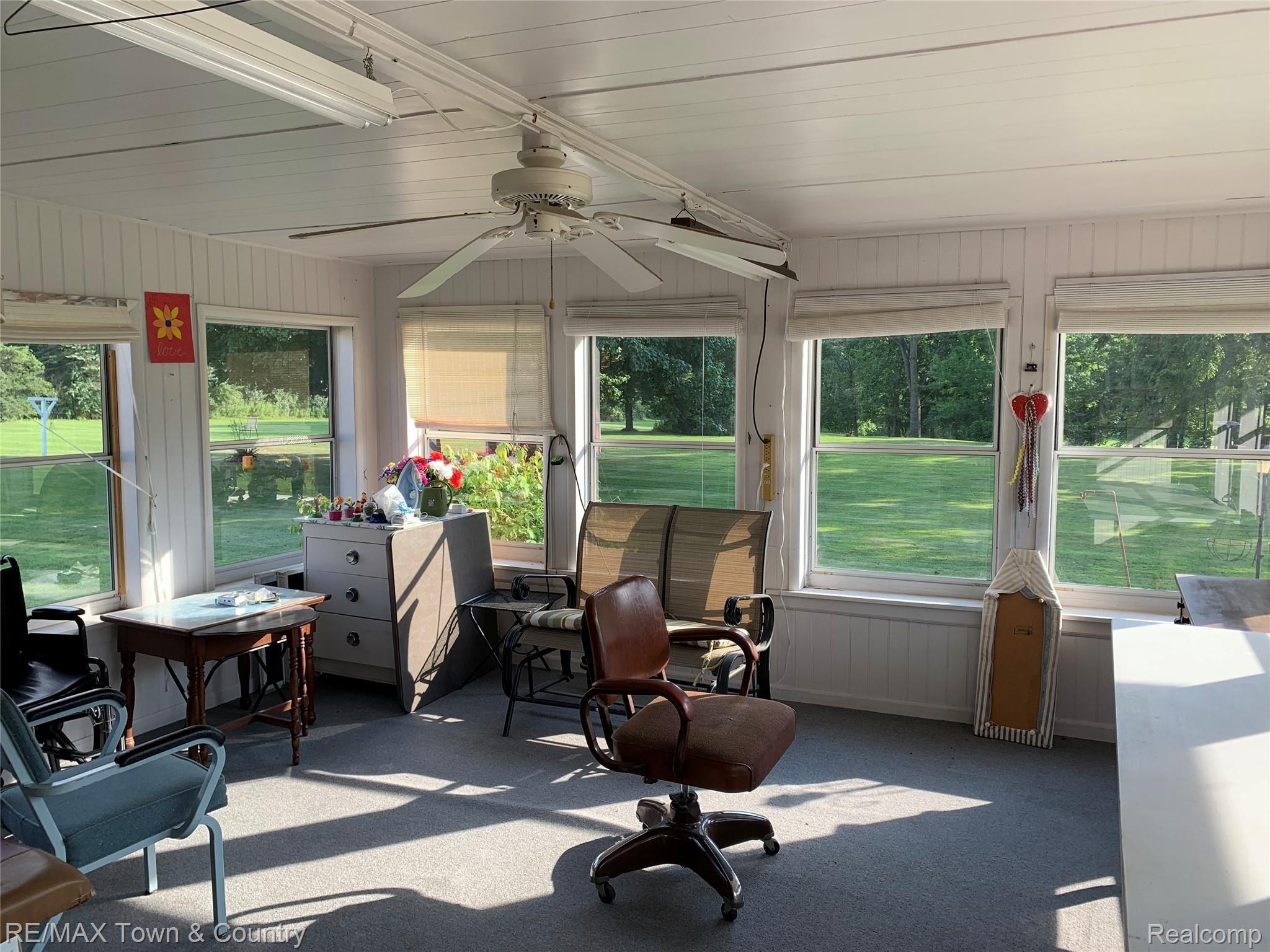 5383 Flushing Road Flushing, MI 48433 - Photo 20 of 28 flushing sunroom 2.jpg