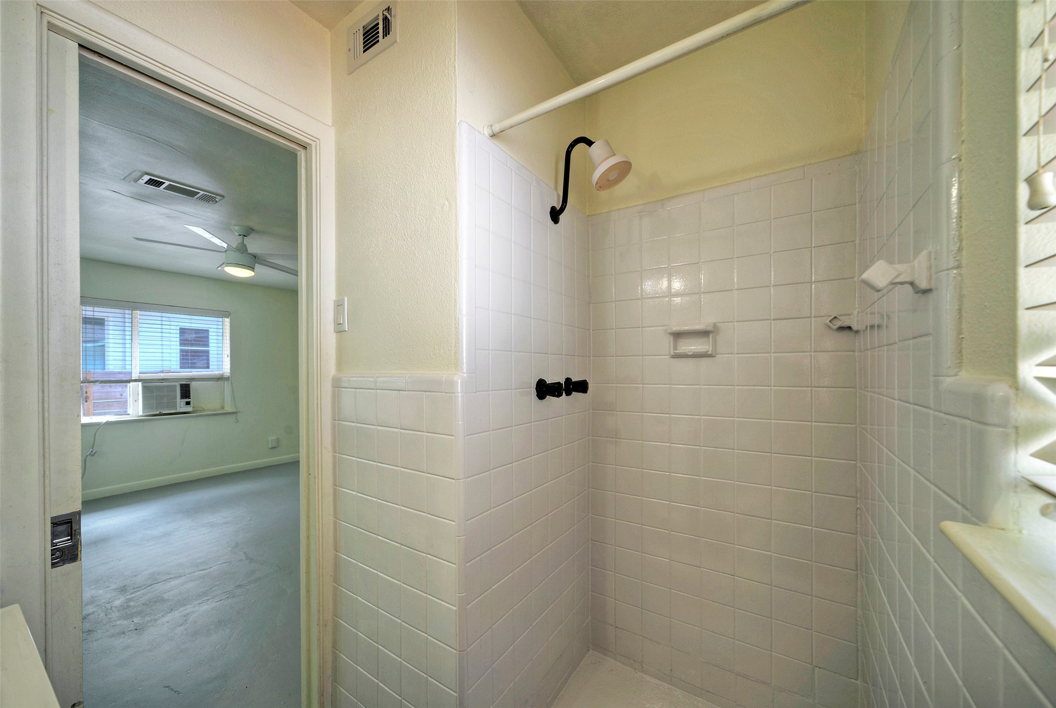1803 Pearl Street Austin, TX 78701 - Photo 15 of 33 a bathroom with a shower