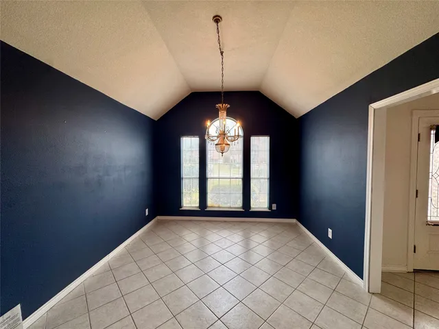 a view of a room with windows