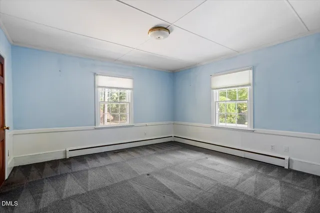 an empty room with window