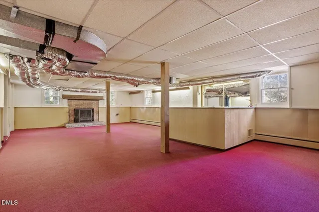 an empty room with a empty space and a window