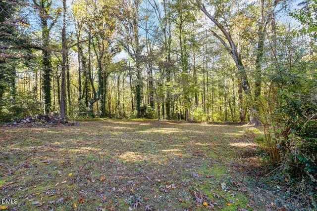 a view of swimming pool with an outdoor space and seating area