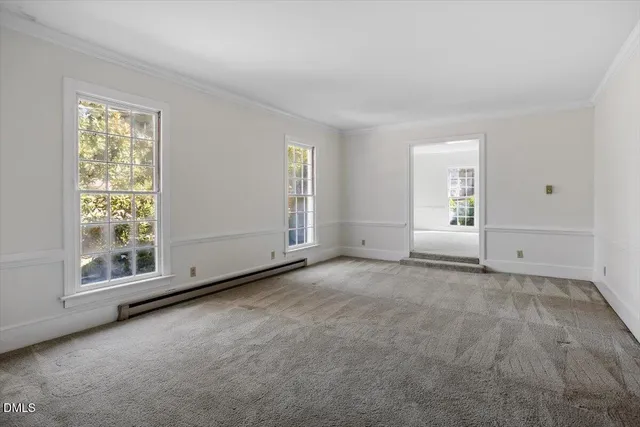 an empty room with windows