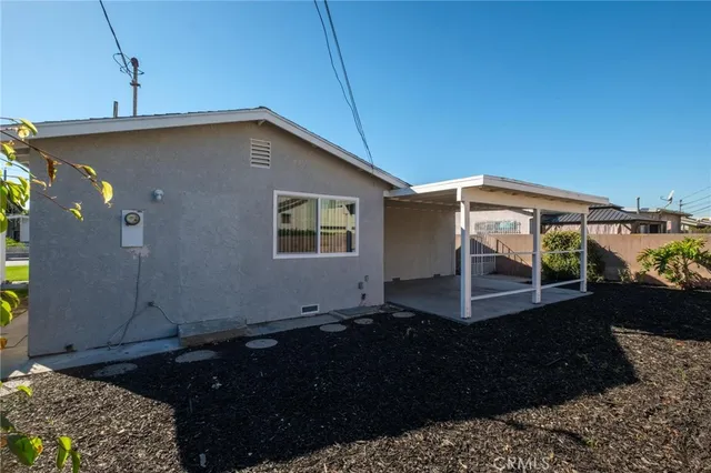 a front view of a house with yard