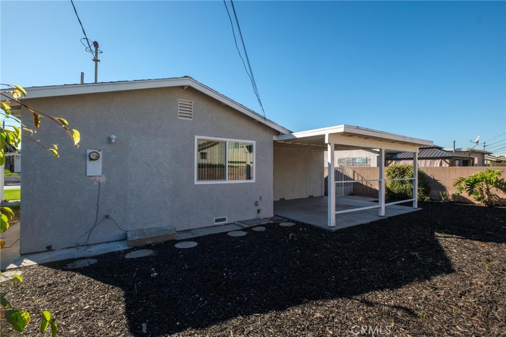 1613 West Piru Street Compton, CA 90222 - Photo 11 of 40 a front view of a house with a yard