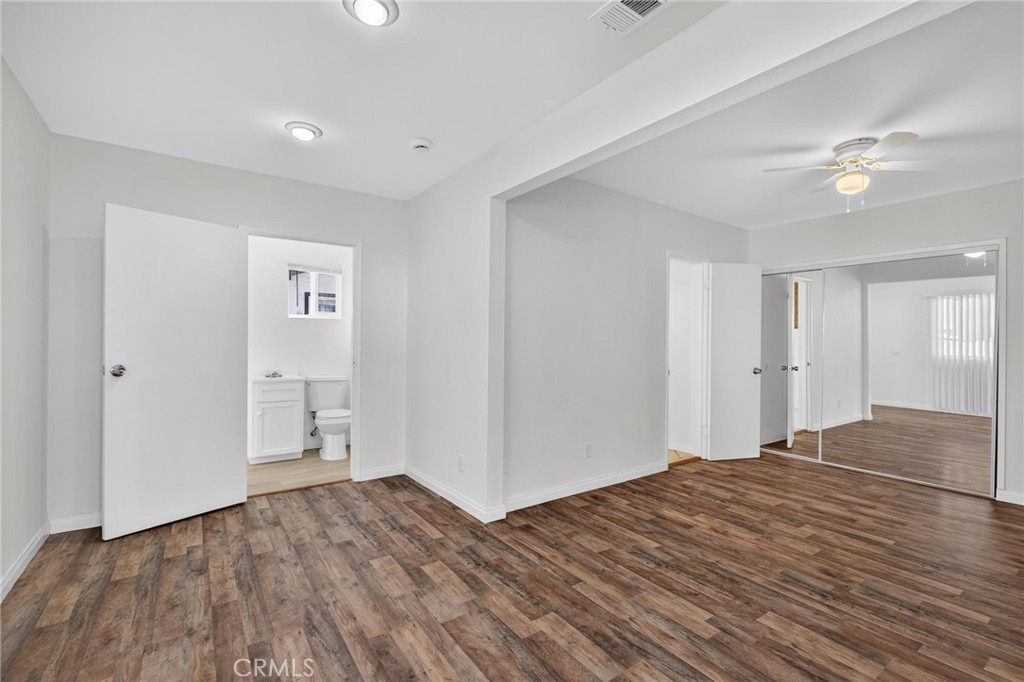 1613 West Piru Street Compton, CA 90222 - Photo 28 of 40 a view of empty room with wooden floor