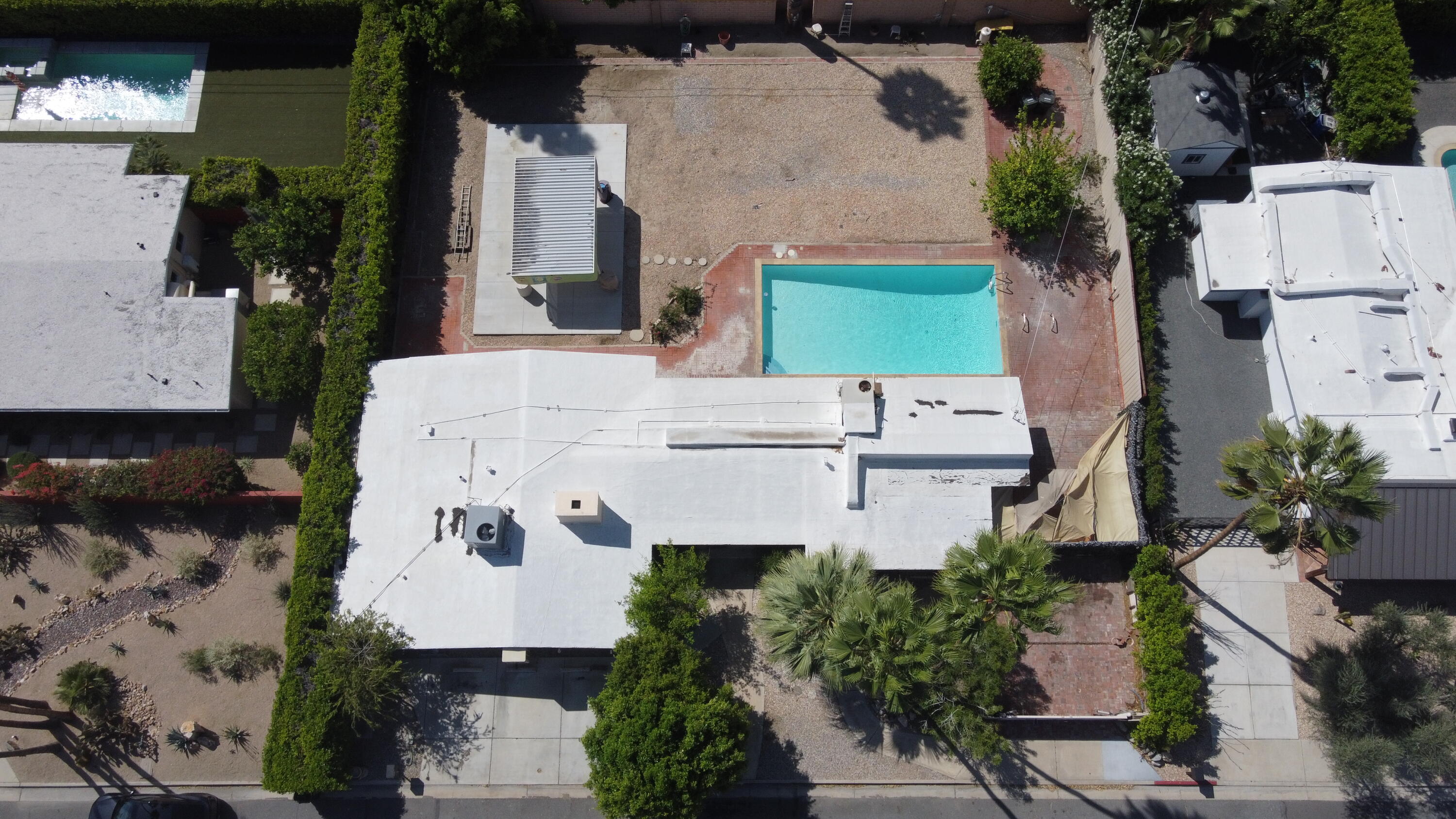1077 South Riverside Drive Palm Springs, CA 92264 - Photo 33 of 35 an aerial view of multiple houses with outdoor space