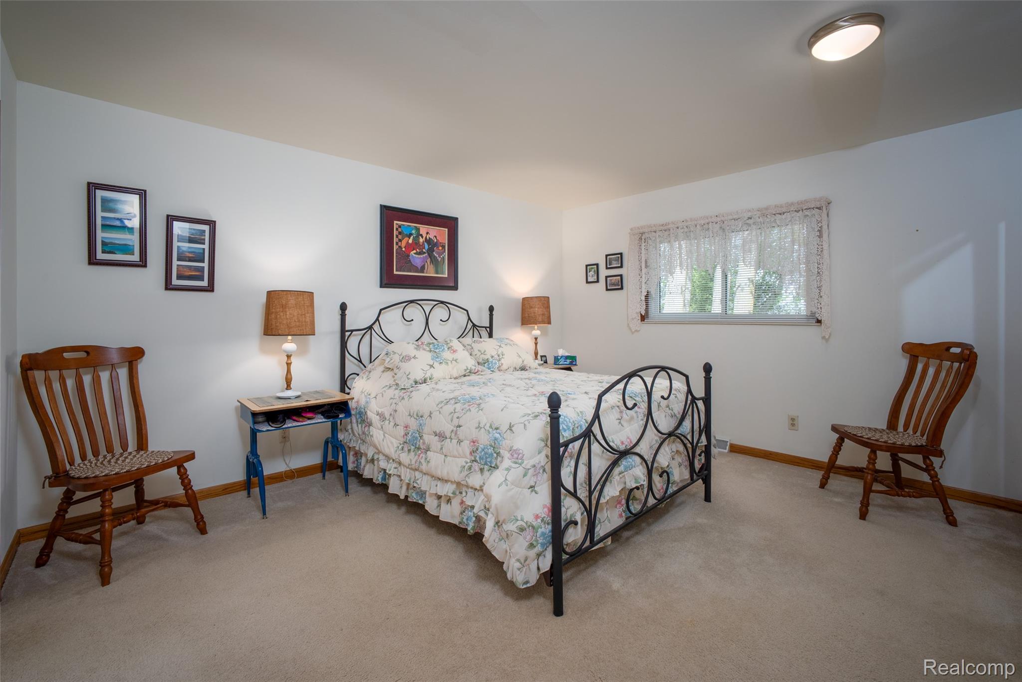 6240 Lakeshore Road Palms, MI 48465 - Photo 14 of 38 Bedroom with light carpet and baseboards