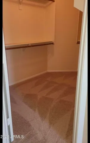 a bathroom with a tub sink and a mirror