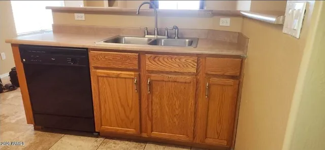 a bathroom with a sink and vanity
