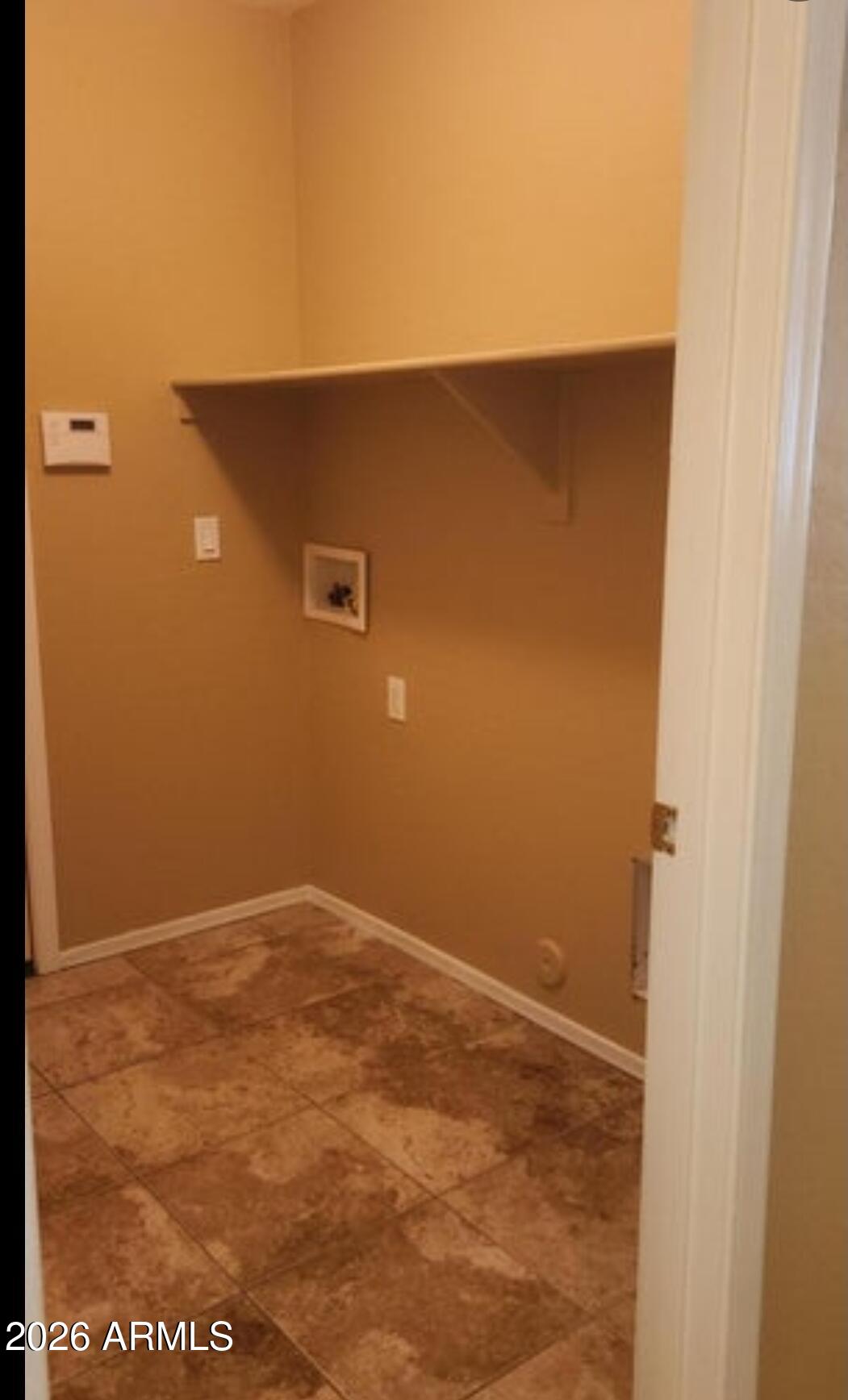 2134 West Pleasant Lane Phoenix, AZ 85041 - Photo 9 of 23 a view of an empty room