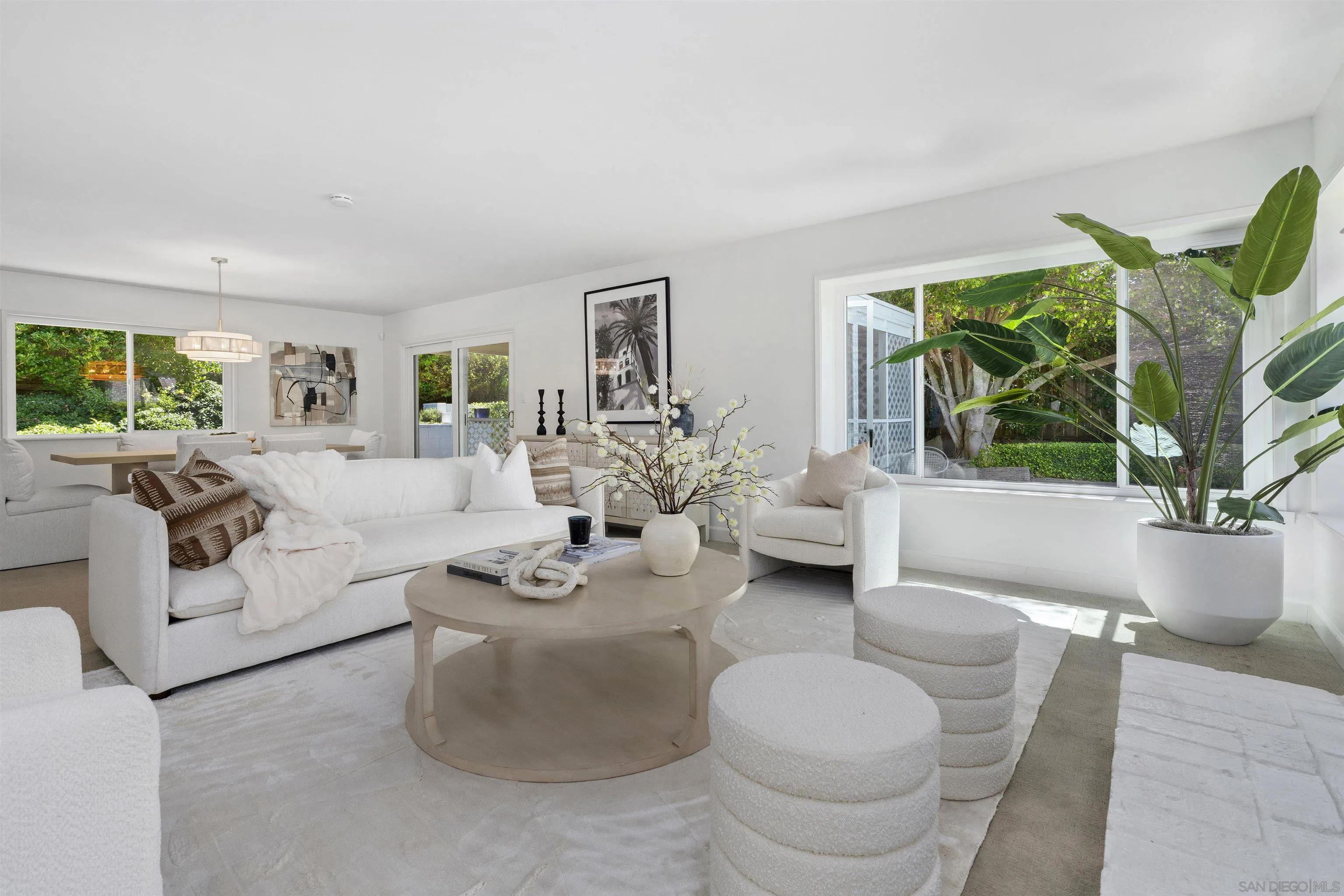 445 Avenida Primavera Del Mar, CA 92014 - Photo 1 of 44 a living room with furniture and a large window