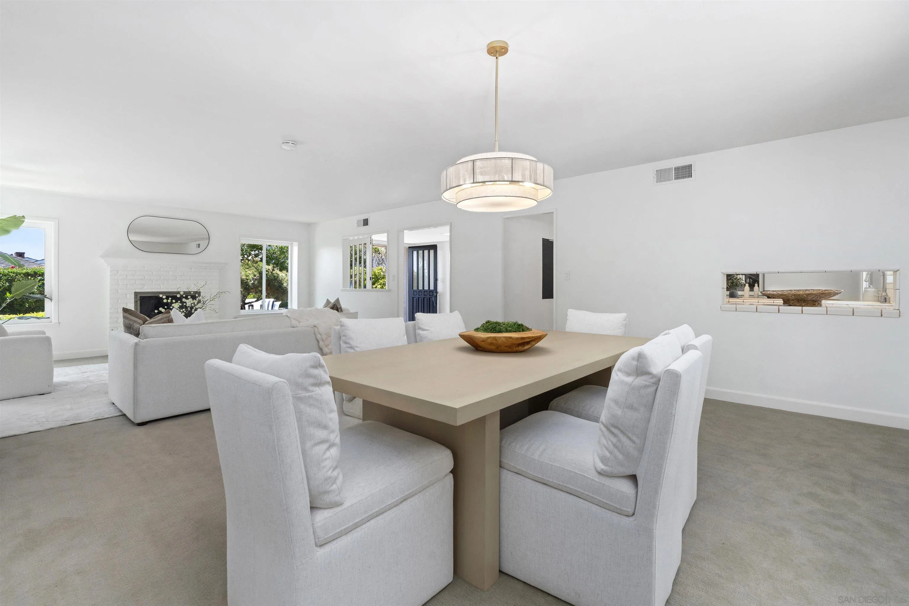 445 Avenida Primavera Del Mar, CA 92014 - Photo 16 of 44 a view of a dining room with furniture