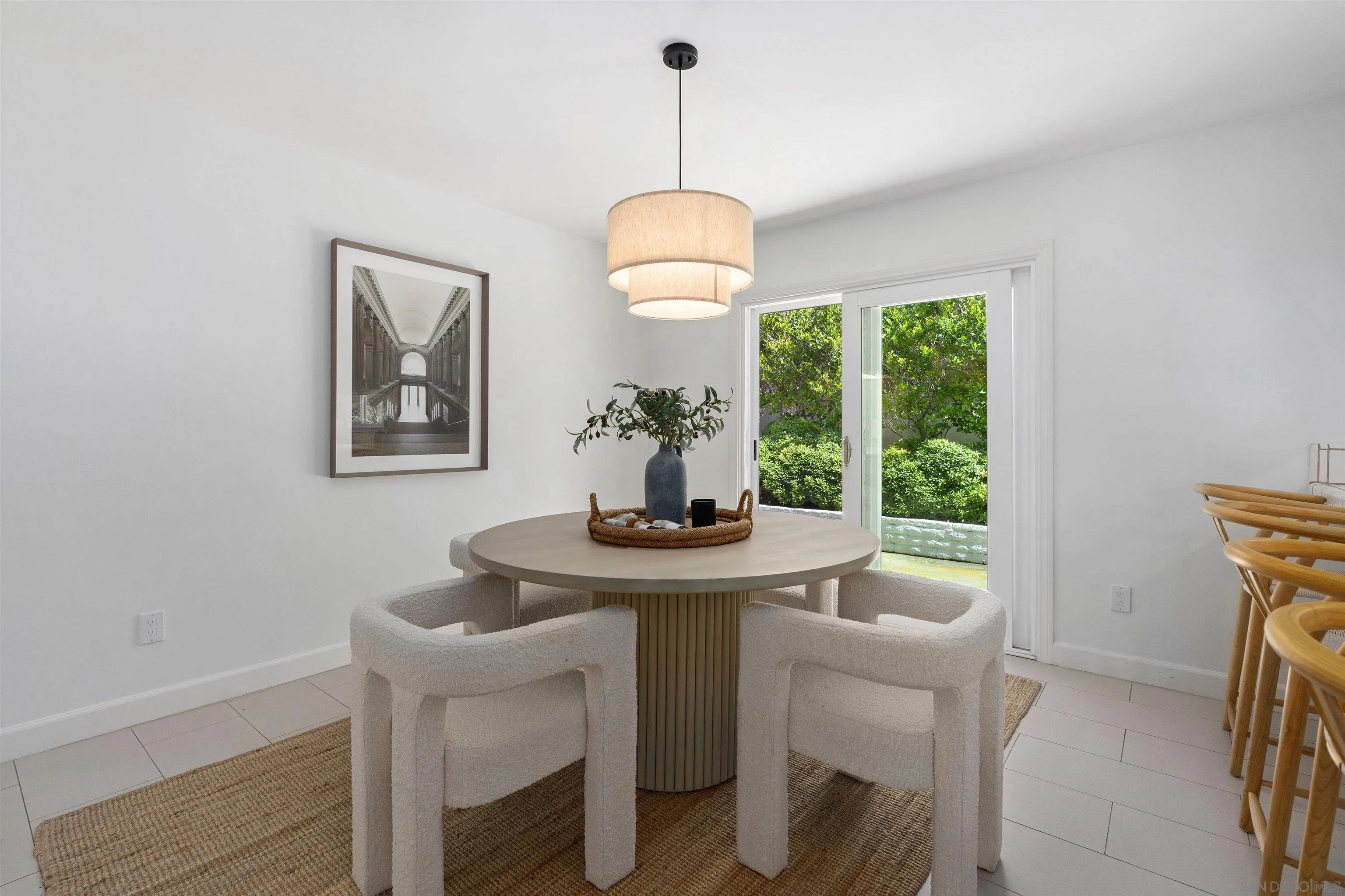 445 Avenida Primavera Del Mar, CA 92014 - Photo 22 of 44 a dining room with a table and chairs