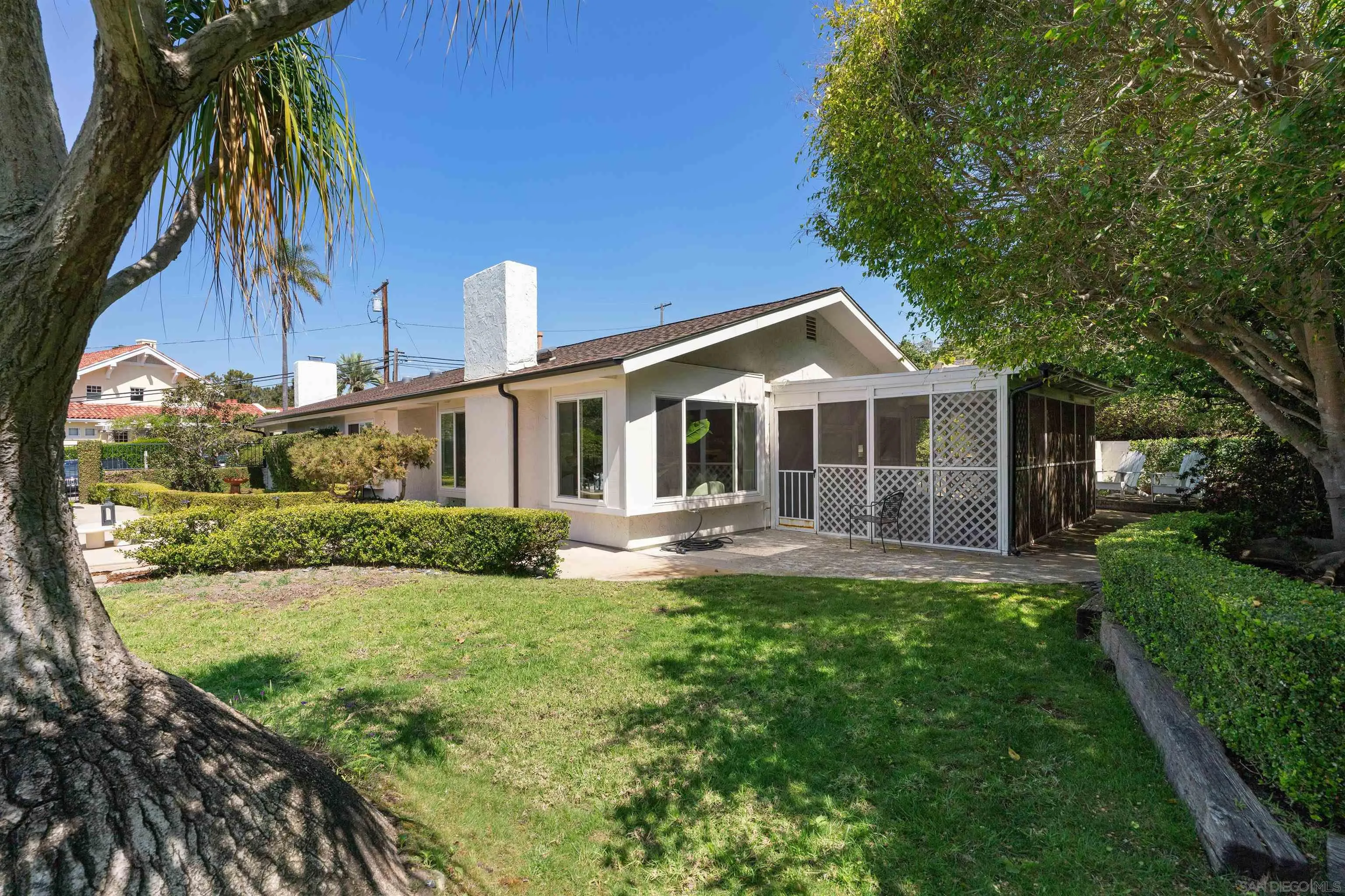 445 Avenida Primavera Del Mar, CA 92014 - Photo 39 of 44 a front view of a house with yard and green space