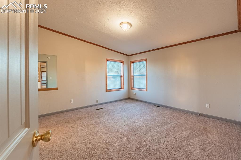 1808 County Road South Rush, CO 80833 - Photo 12 of 36 an empty room with windows
