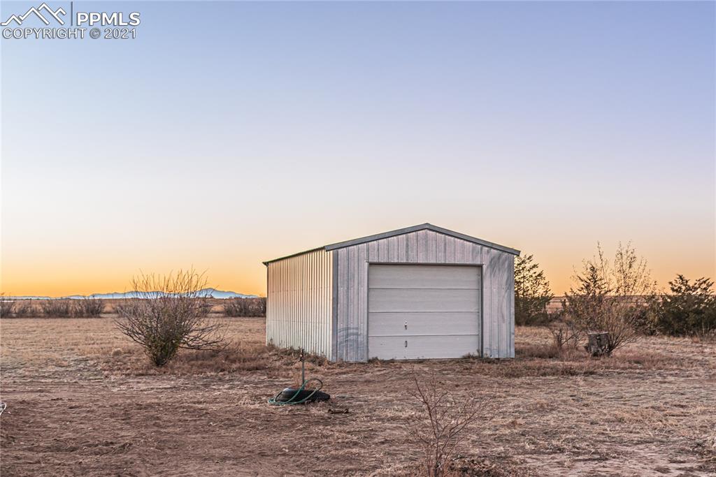 1808 County Road South Rush, CO 80833 - Photo 22 of 36 a house view with a outdoor space