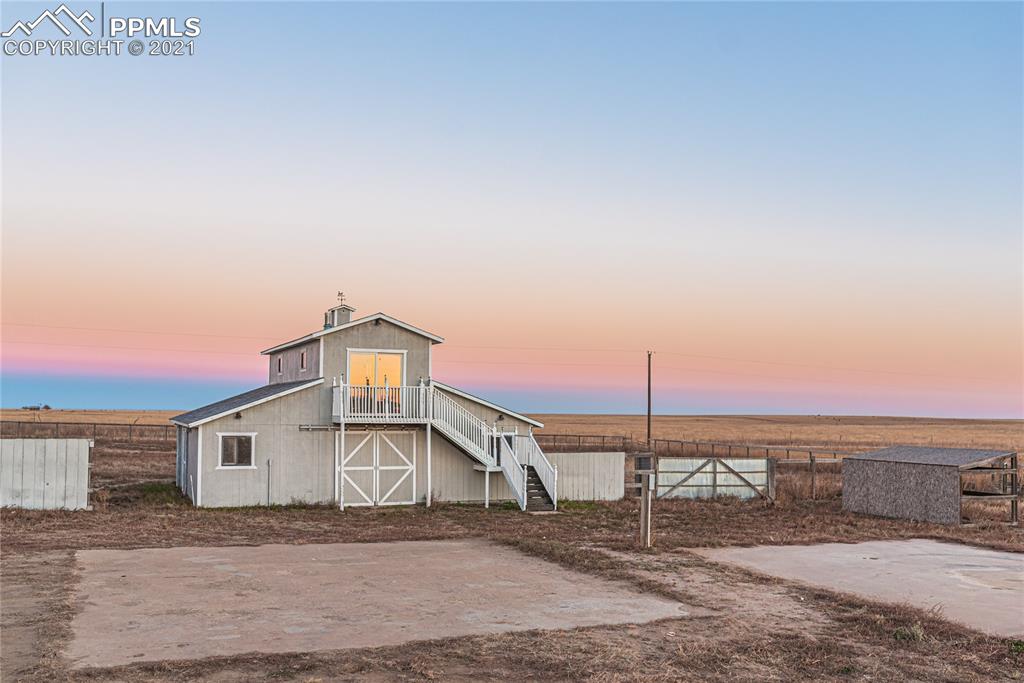 1808 County Road South Rush, CO 80833 - Photo 23 of 36 a view of a house with a outdoor space