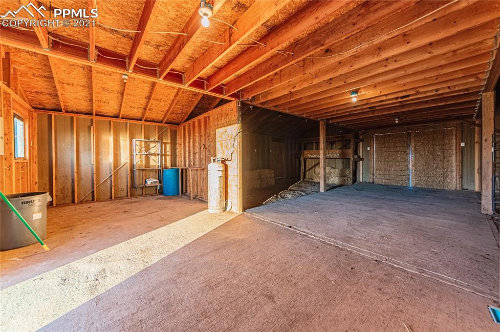1808 County Road South Rush, CO 80833 - Photo 26 of 36 a view of a room with wooden walls