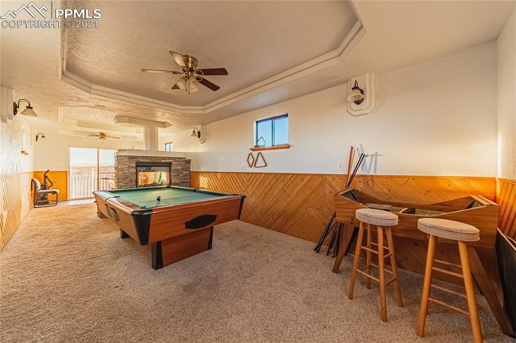 1808 County Road South Rush, CO 80833 - Photo 27 of 36 a living room with furniture and a ceiling fan