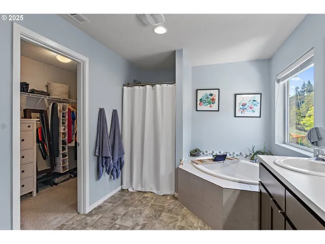 a kitchen with a refrigerator and a sink