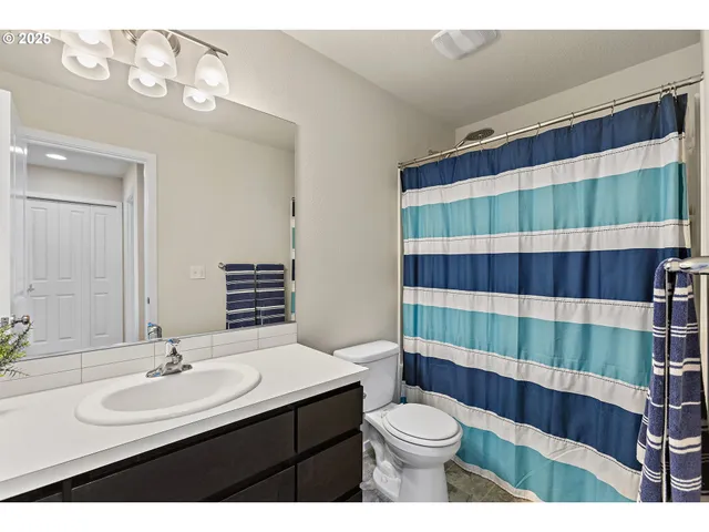 a bedroom with a bed and furniture