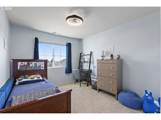 a view of room with cabinet and mirror