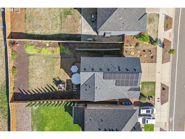 an aerial view of residential building and ocean