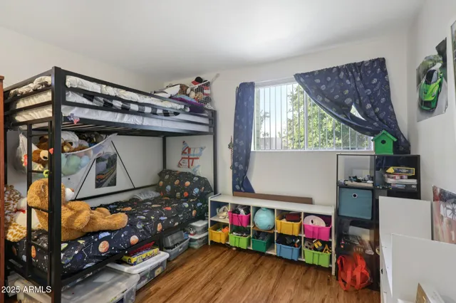 a view of a chairs and table in a patio