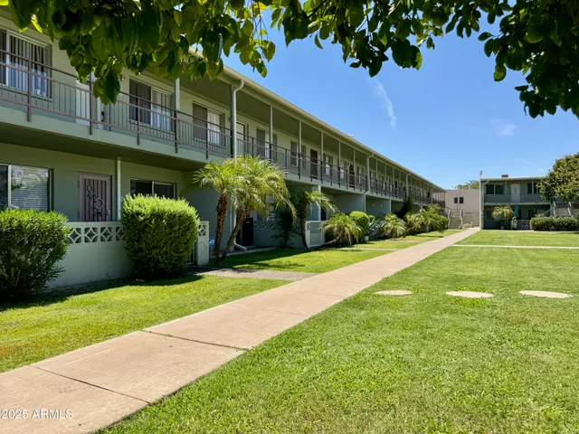 a kitchen with a sink stove and microwave