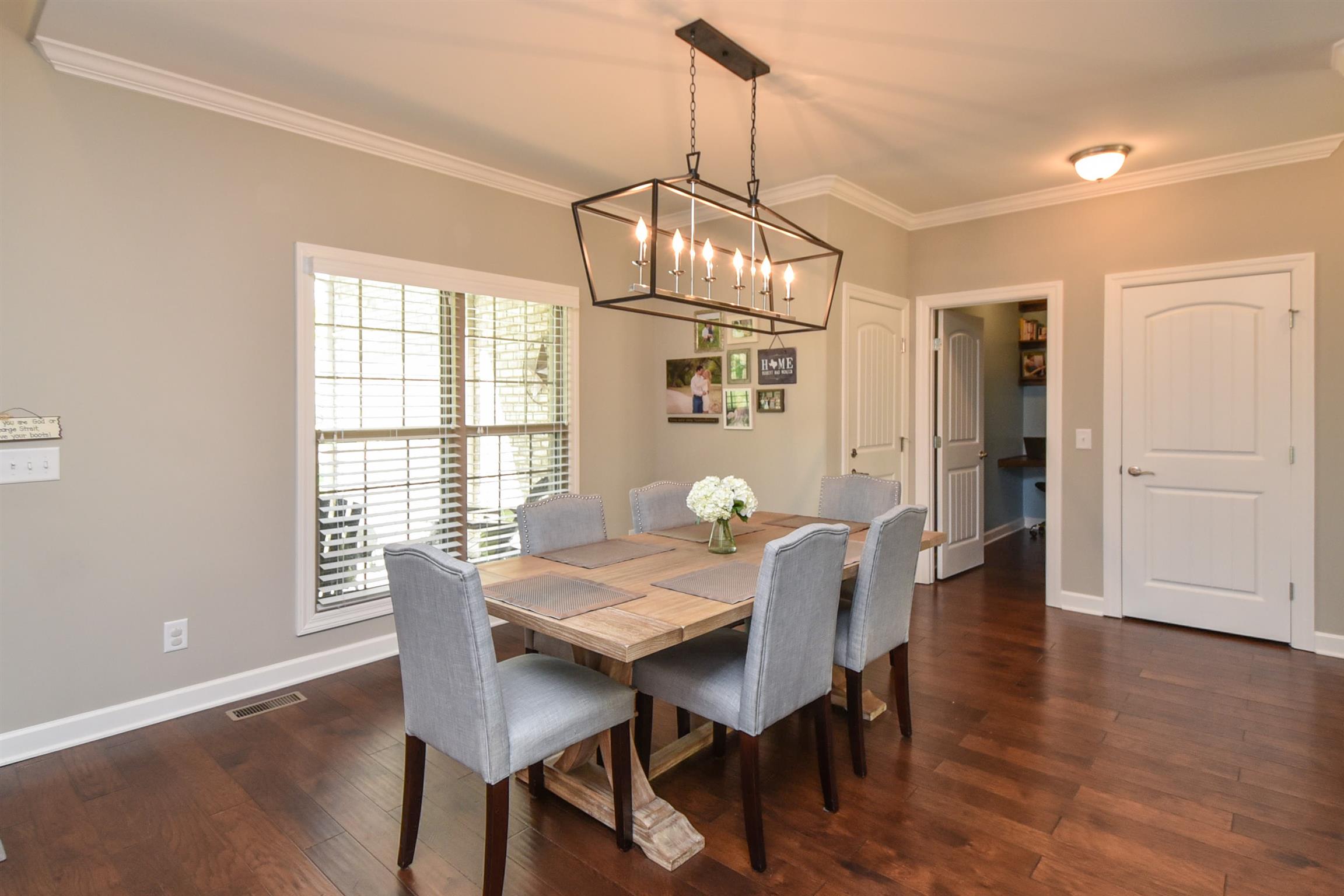 310 Independence Street Springfield, TN 37172 - Photo 12 of 29 a view of a dining room with furniture window and wooden floor