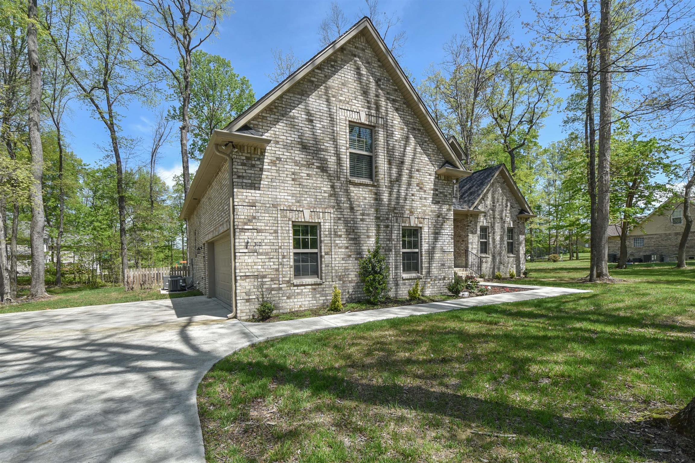 310 Independence Street Springfield, TN 37172 - Photo 2 of 29 a view of a house with a yard