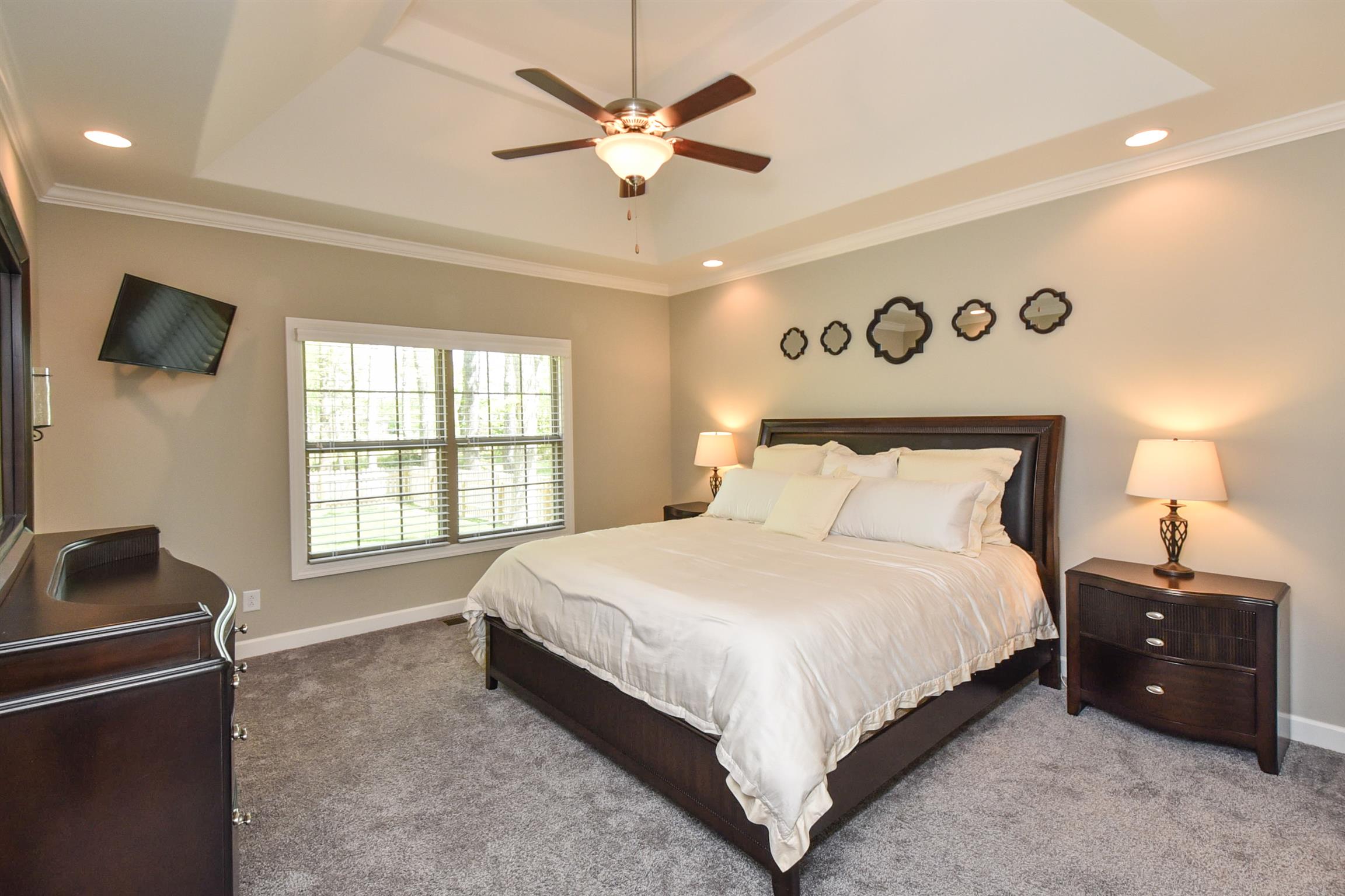 310 Independence Street Springfield, TN 37172 - Photo 21 of 29 a bedroom with a bed and a television