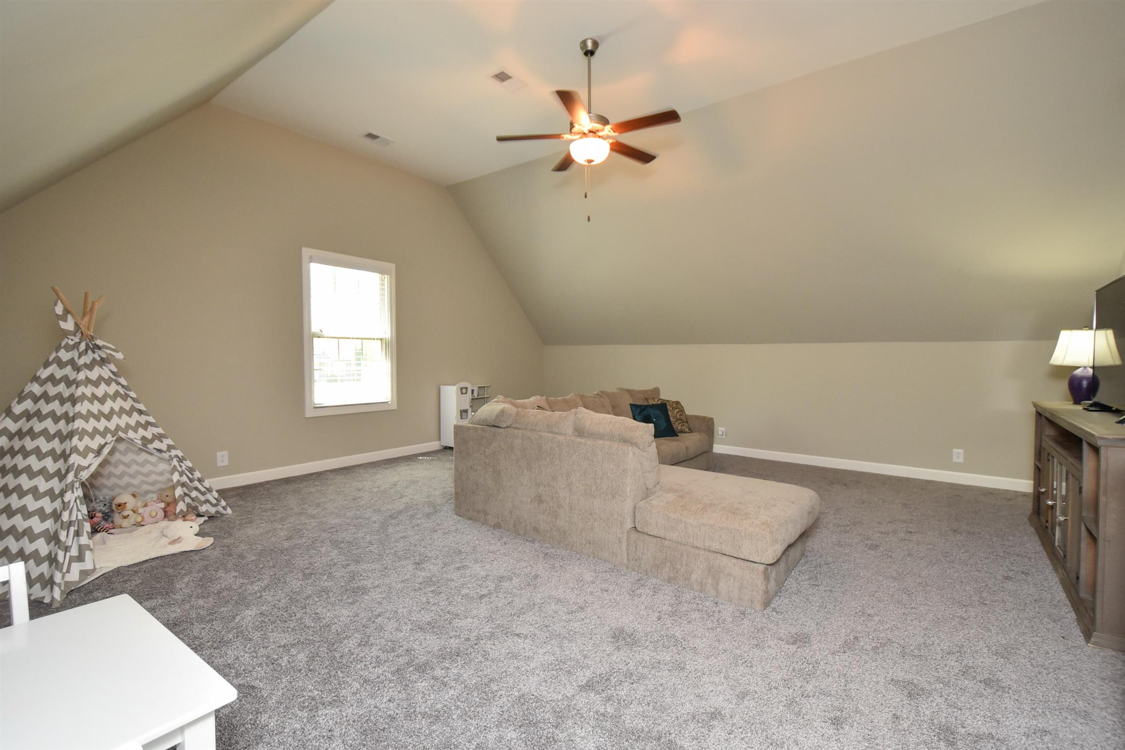 310 Independence Street Springfield, TN 37172 - Photo 27 of 29 a living room with furniture and a window