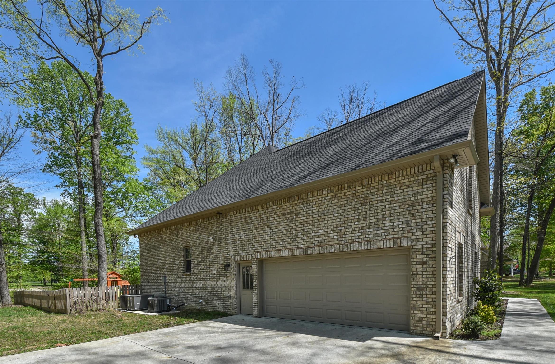 310 Independence Street Springfield, TN 37172 - Photo 3 of 29 a front view of a house with garden