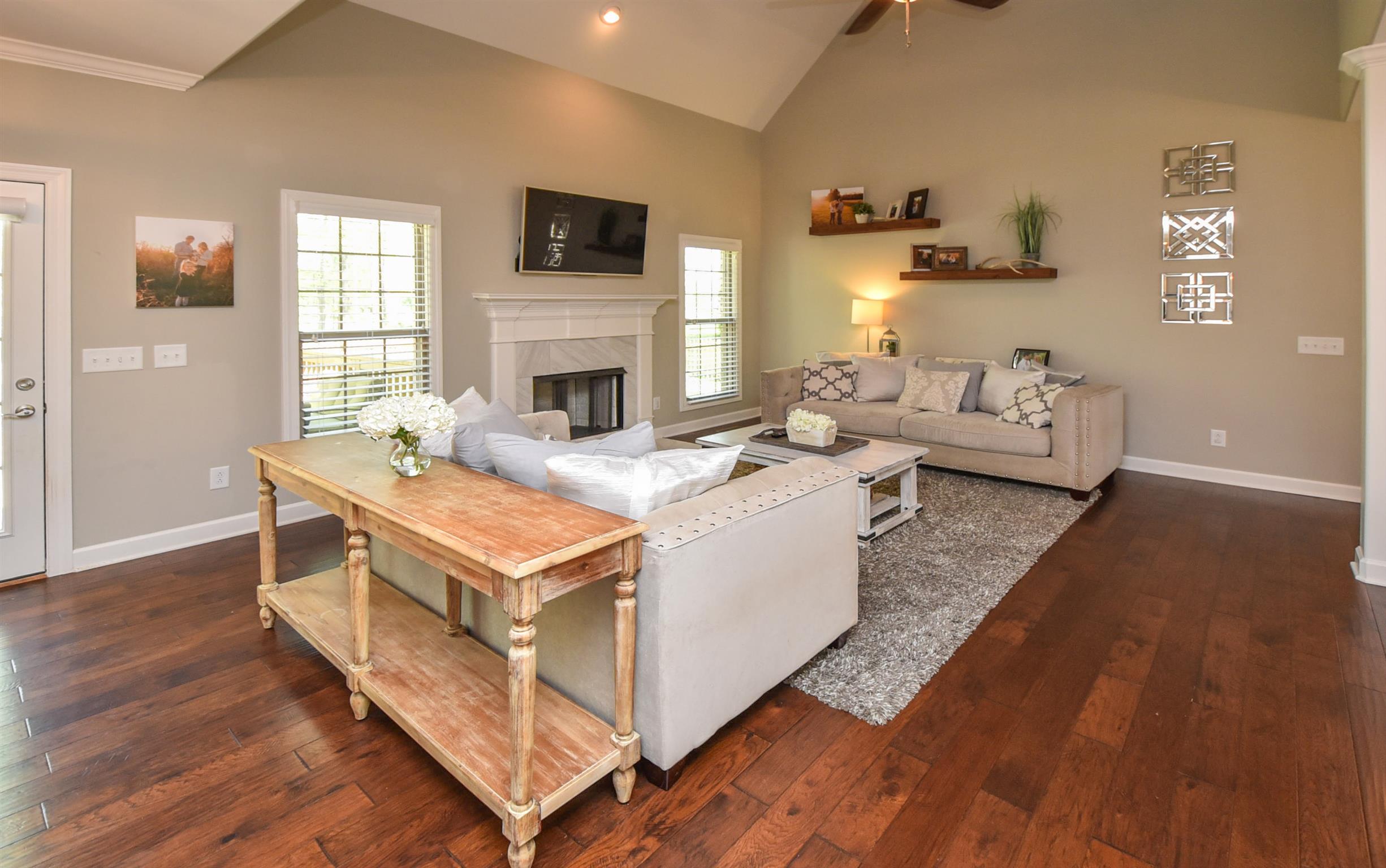 310 Independence Street Springfield, TN 37172 - Photo 8 of 29 a living room with furniture and a fireplace