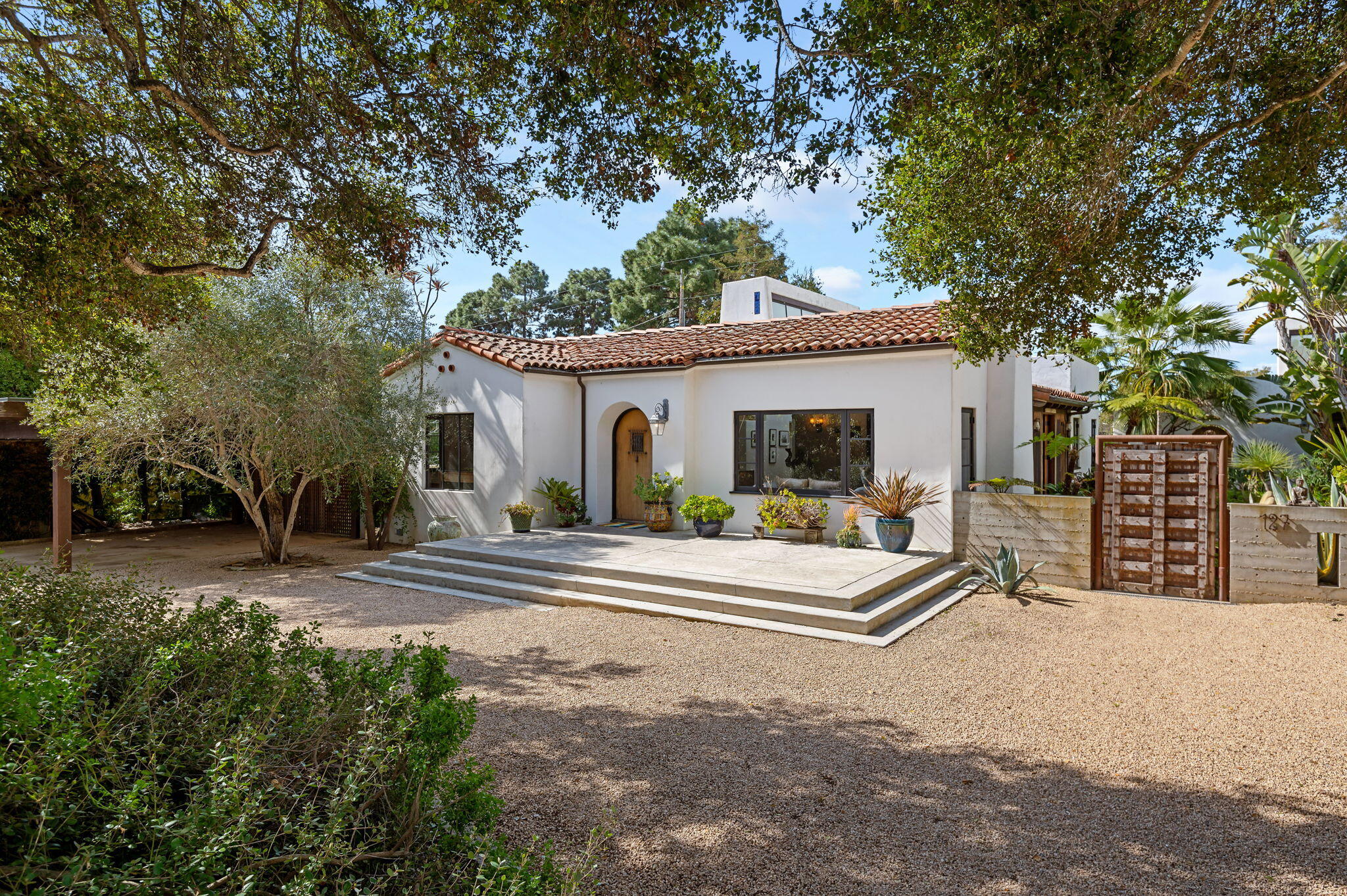 127 Hermosillo Road Montecito, CA 93108 - Photo 1 of 37 a view of a house with backyard and trees