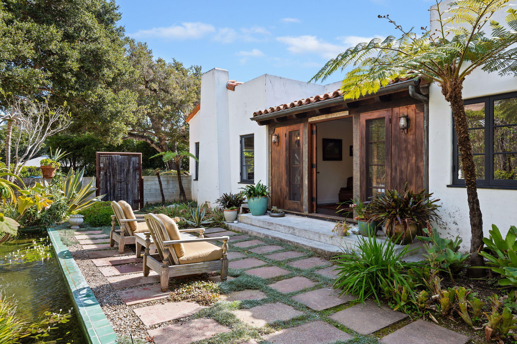 127 Hermosillo Road Montecito, CA 93108 - Photo 26 of 37 a view of a house with backyard and sitting area