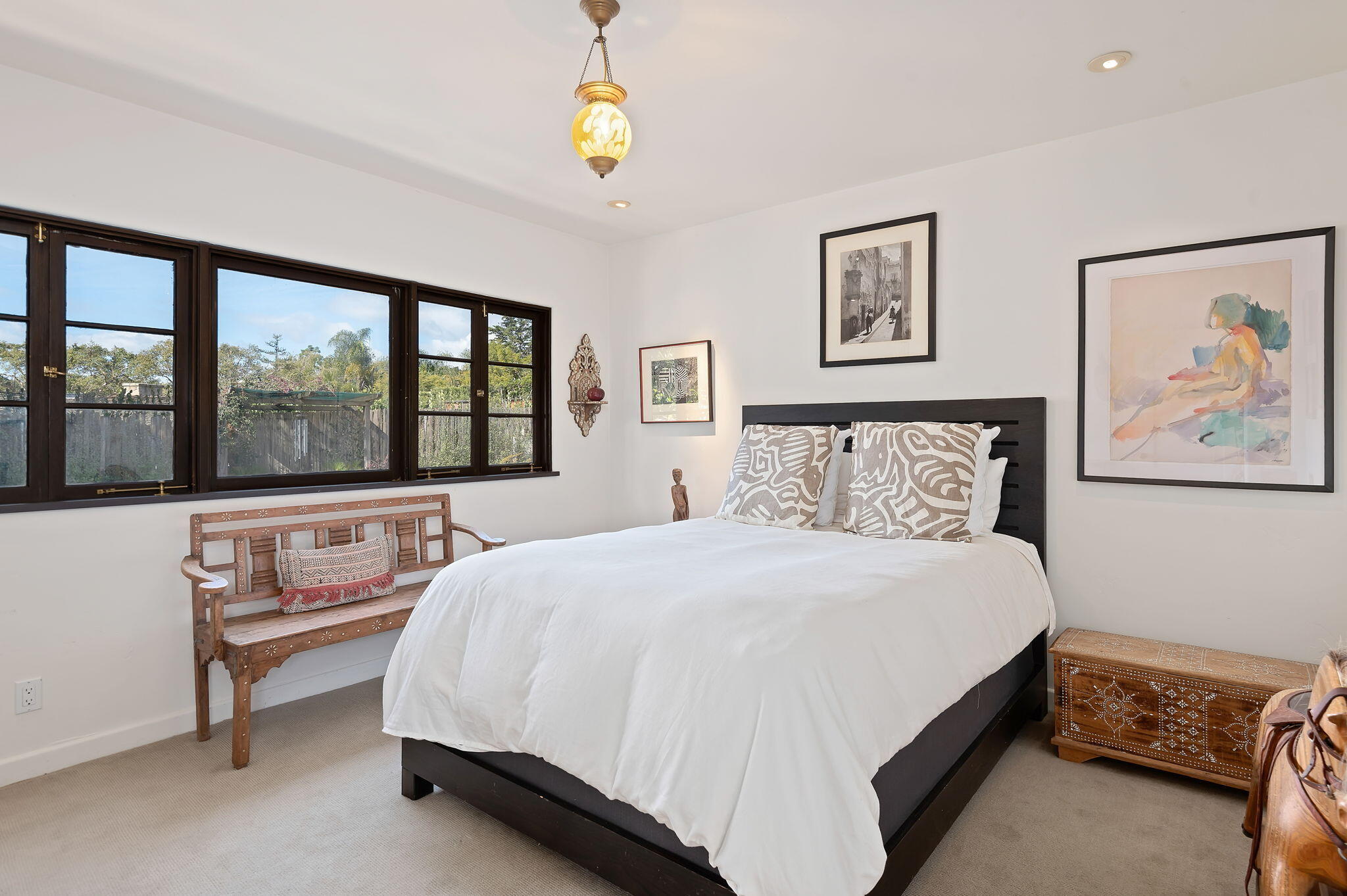 127 Hermosillo Road Montecito, CA 93108 - Photo 32 of 37 a bedroom with a bed and a large window