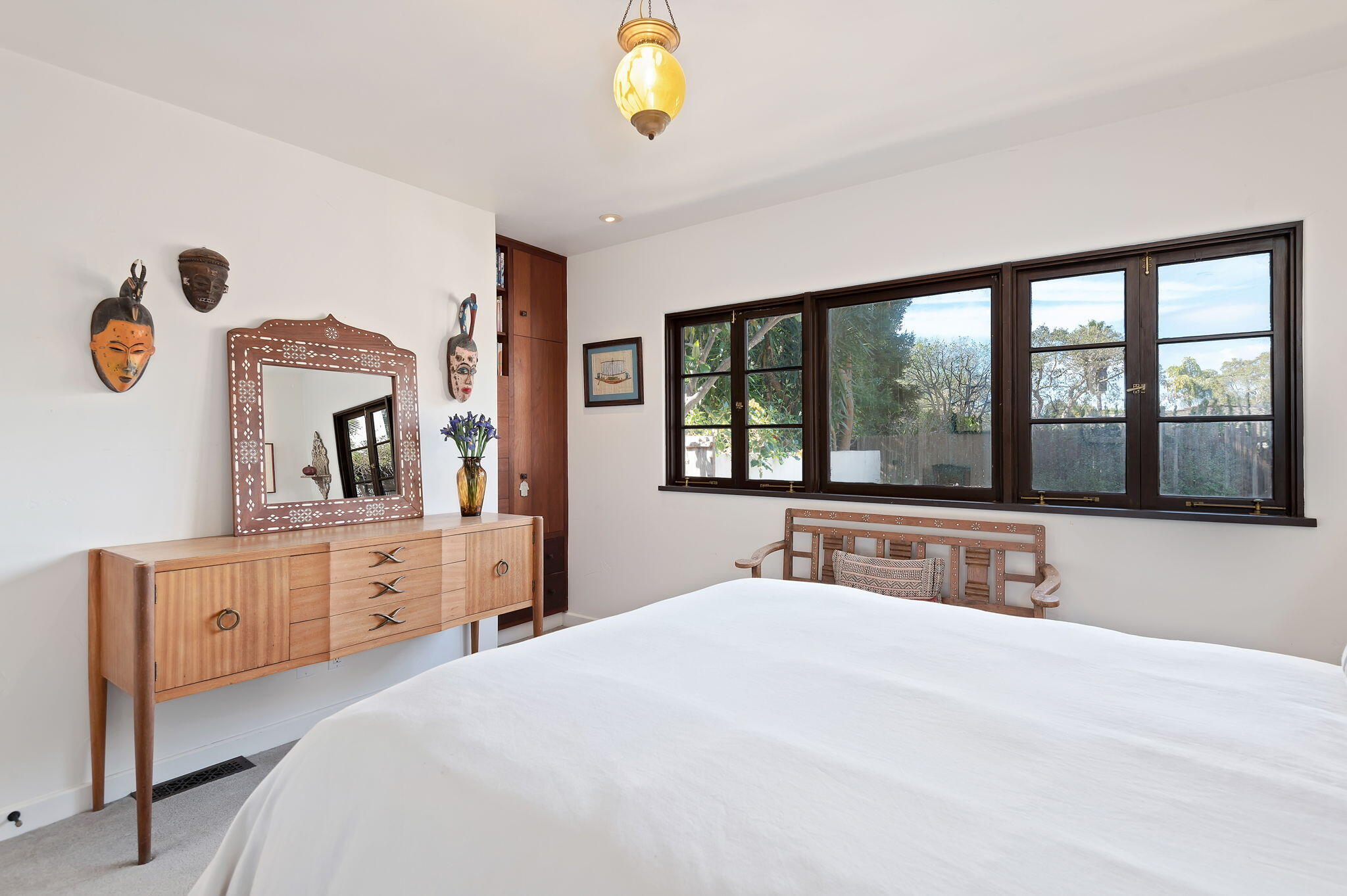 127 Hermosillo Road Montecito, CA 93108 - Photo 33 of 37 a bedroom with a bed and a large window