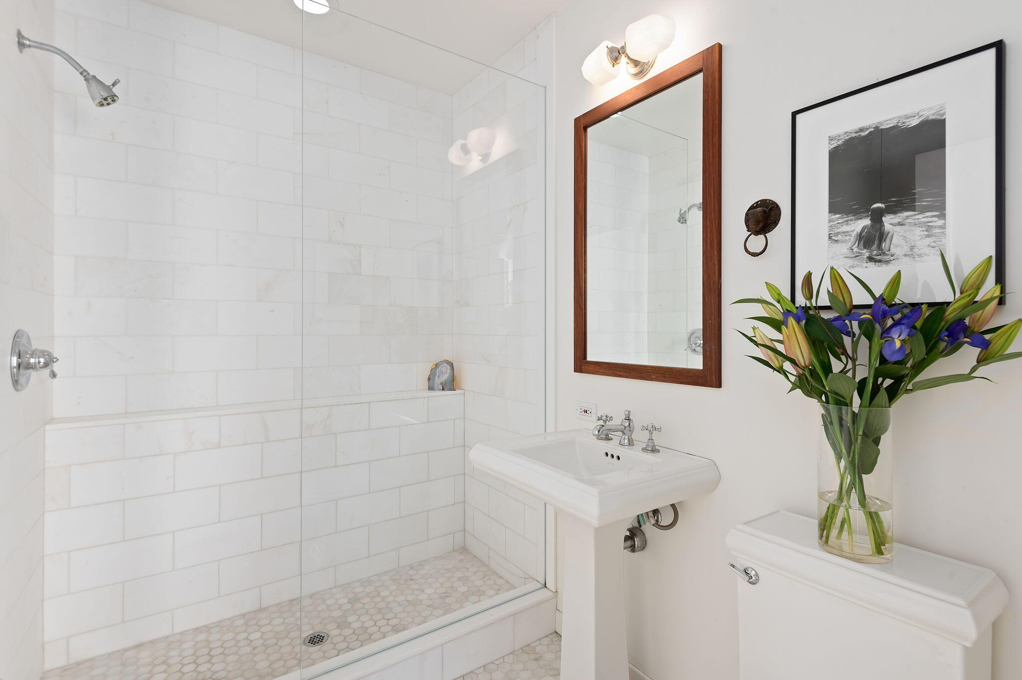 127 Hermosillo Road Montecito, CA 93108 - Photo 34 of 37 a bathroom with a shower sink and mirror